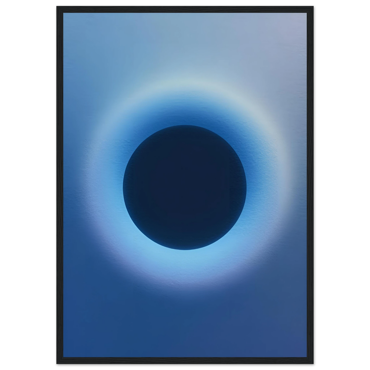Cosmic aura eclipse art print mesmerizing blue black abstract circle for modern decor available in multiple sizes and frames art print in a Wood frame size 21x29.7 cm / 8x12" affordable wall art by Art Aunty NZ
